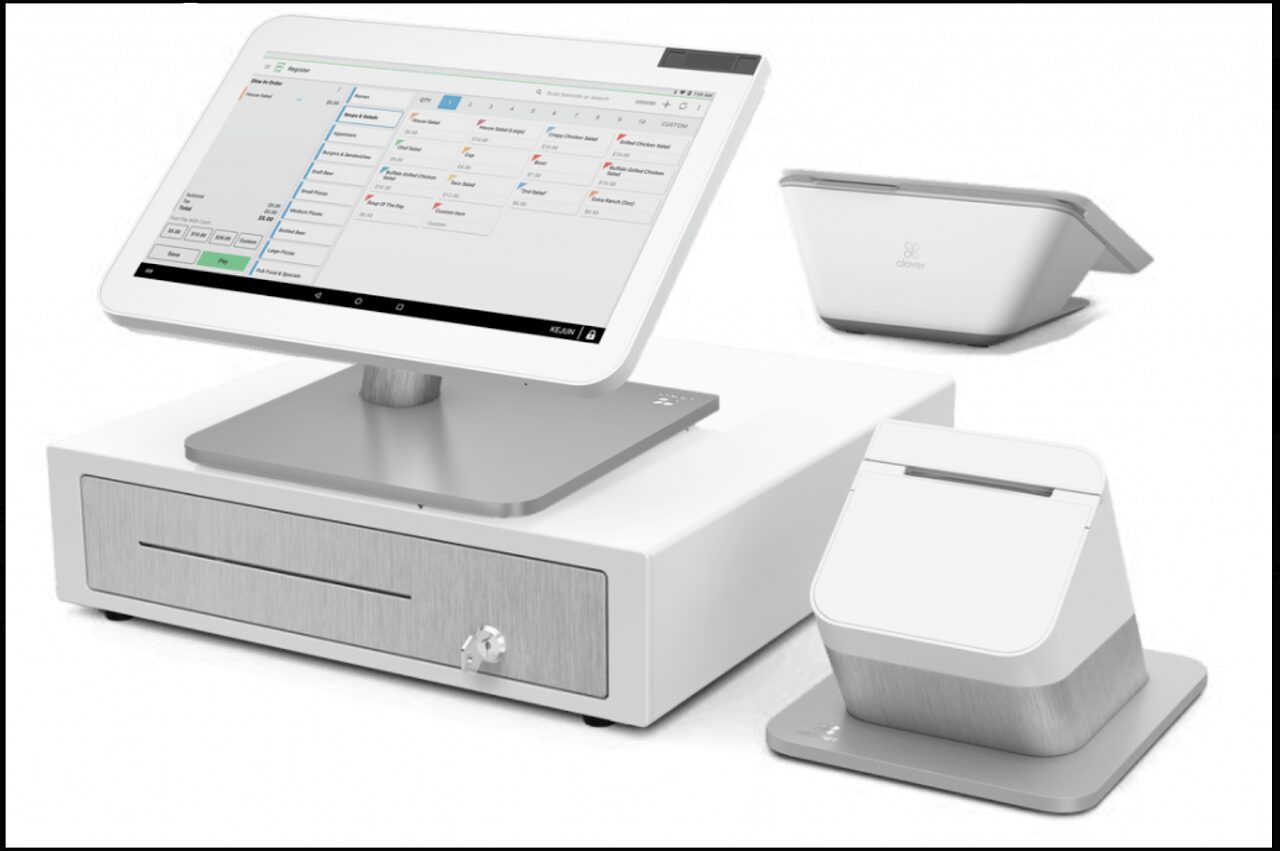 A modern point-of-sale system with a touchscreen, cash drawer, and card reader.